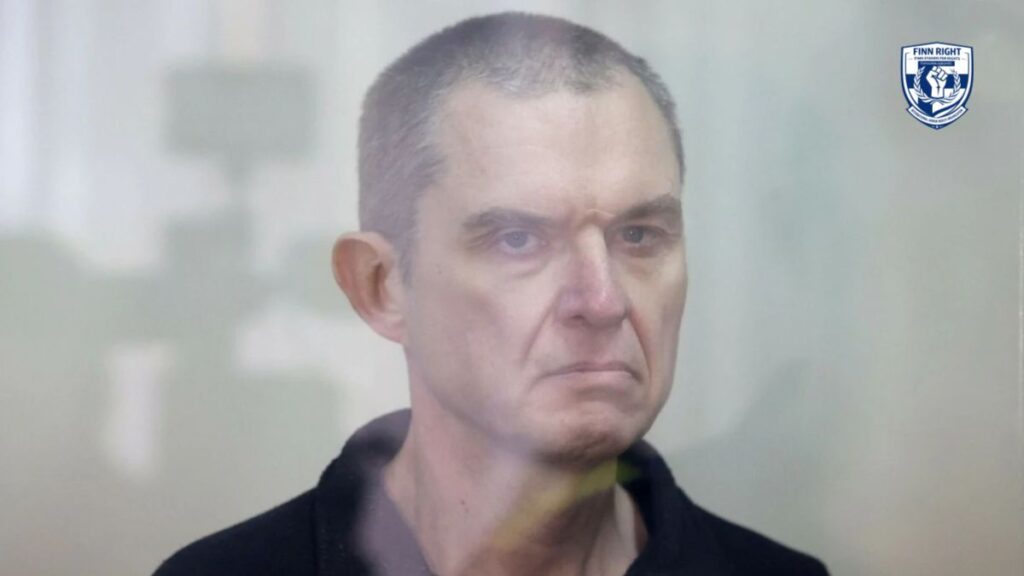 Freedom Delayed in Belarus showing journalist release, highlighting political prisoners and press freedom struggles.